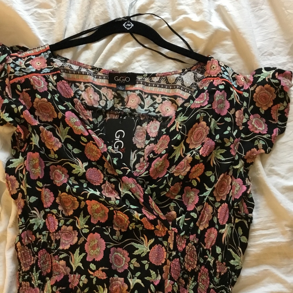 New Flowy dress with flutter sleeves.
